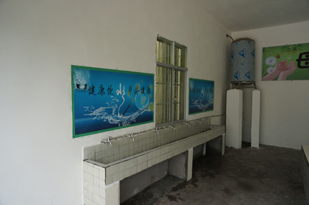 Drinking water taps in Zhongtian Town Central School in Liangshan Prefecture of southwest China's Sichuan Province  